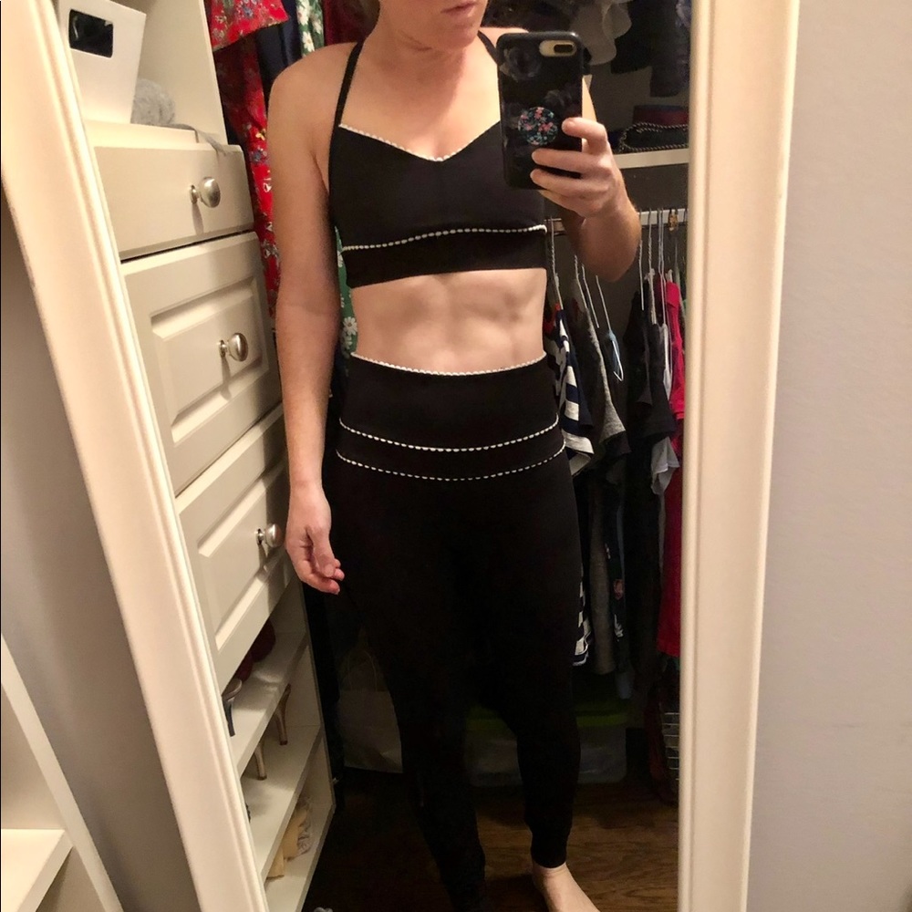 Alala black sports bra with white detail